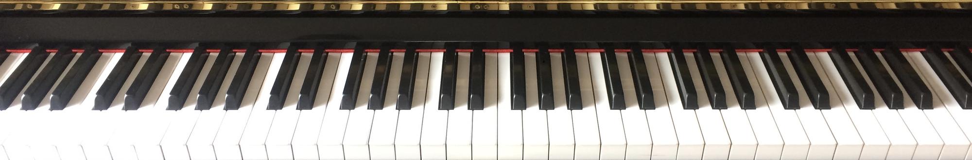 my beautiful yamaha piano, gorgeous to play and teach on.